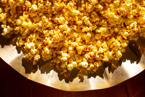 popcorn in a sun lit bowl